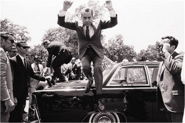 Nixon_jumps_off_car